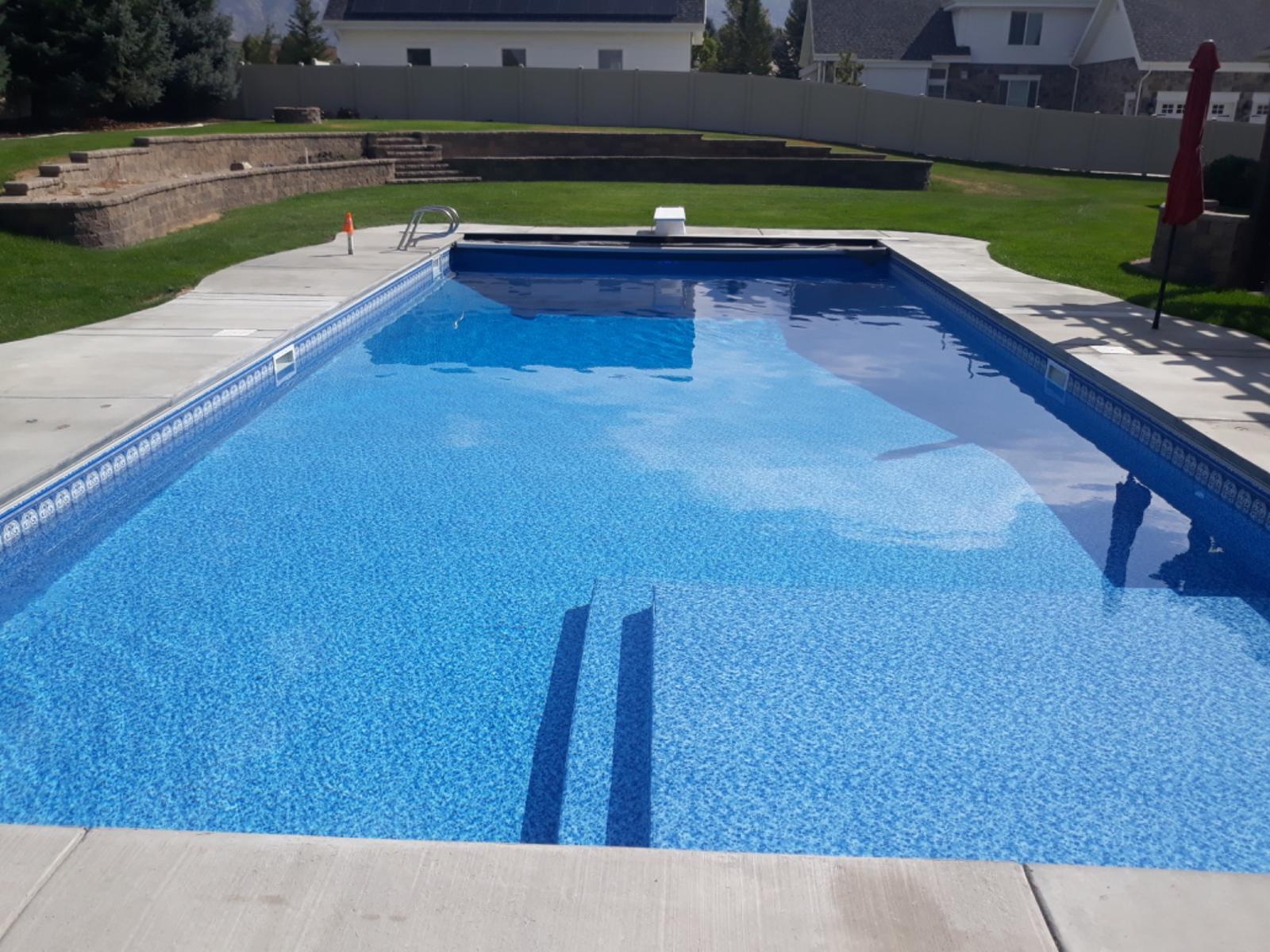 Finished residential swimming pool and patio
