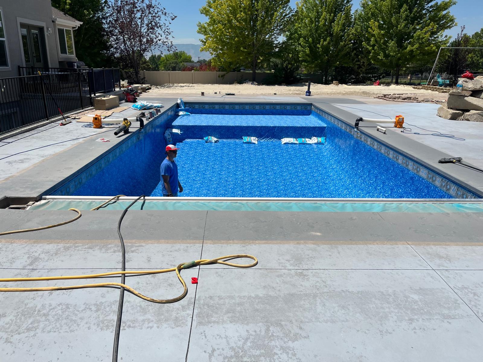 Outdoor swimming pool with family gathering space