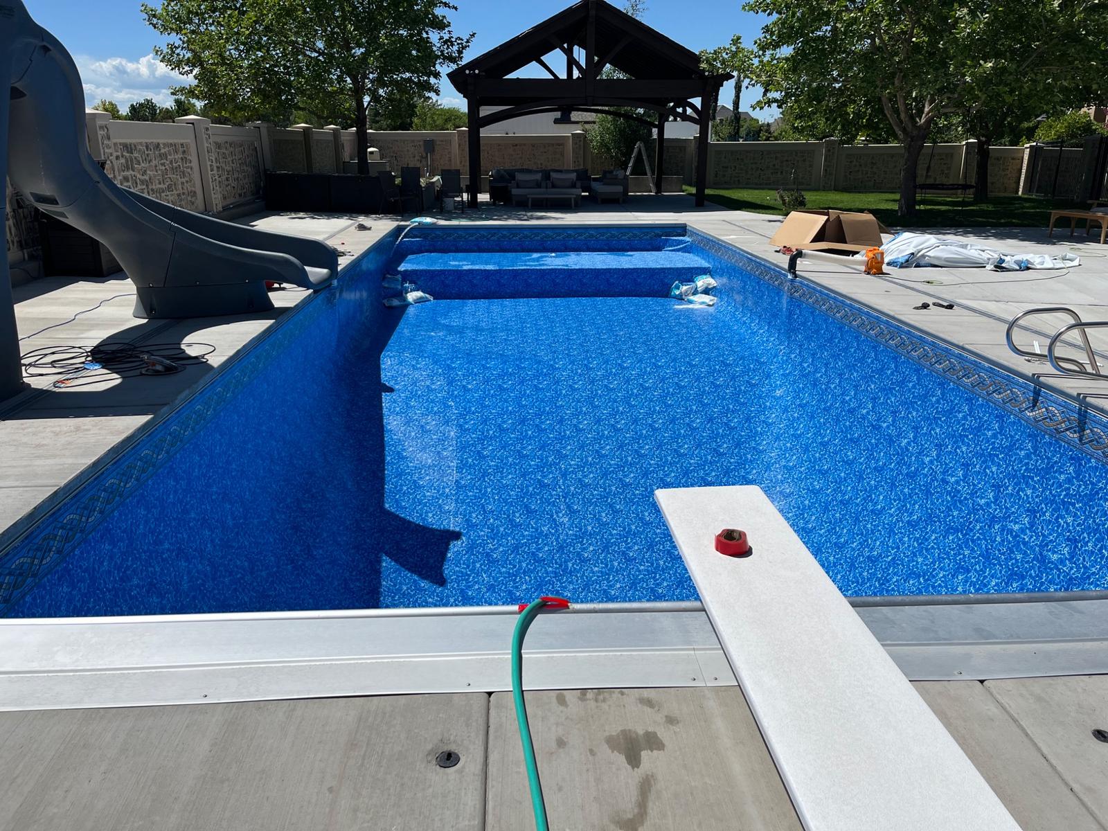 Completed pool and surrounding outdoor living area