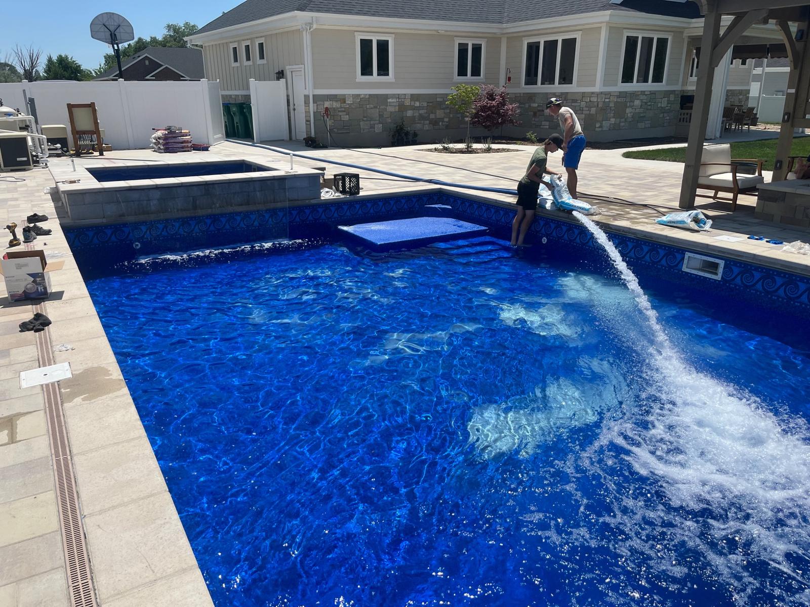 Custom backyard pool installation